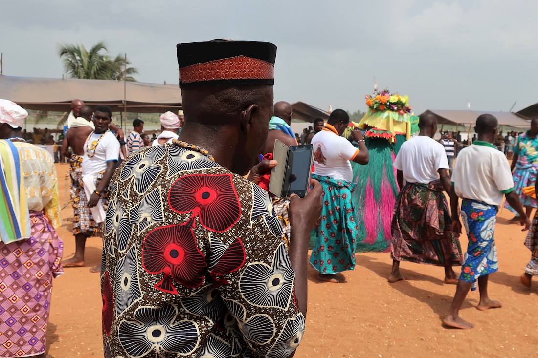 Procession and a photographer.