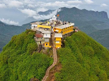 Hike through the night to watch dawn break over sacred Adam's Peak