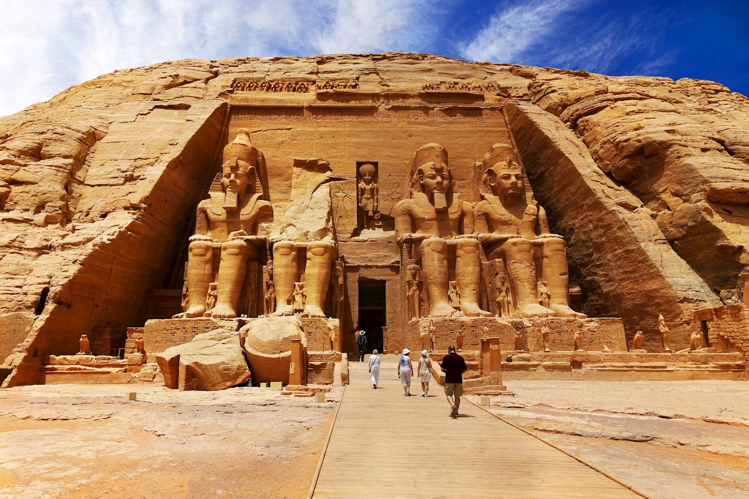 Be dwarfed by the majestic Ramses Il at Abu Simbel