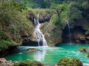 Cool off in the jungle-shrouded Swimming hole of Semuc Champey