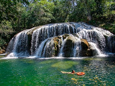 Drift through clear waters and dripping karst in Bonito