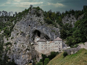 Clamber through Postojna Cave and Predjama Castle